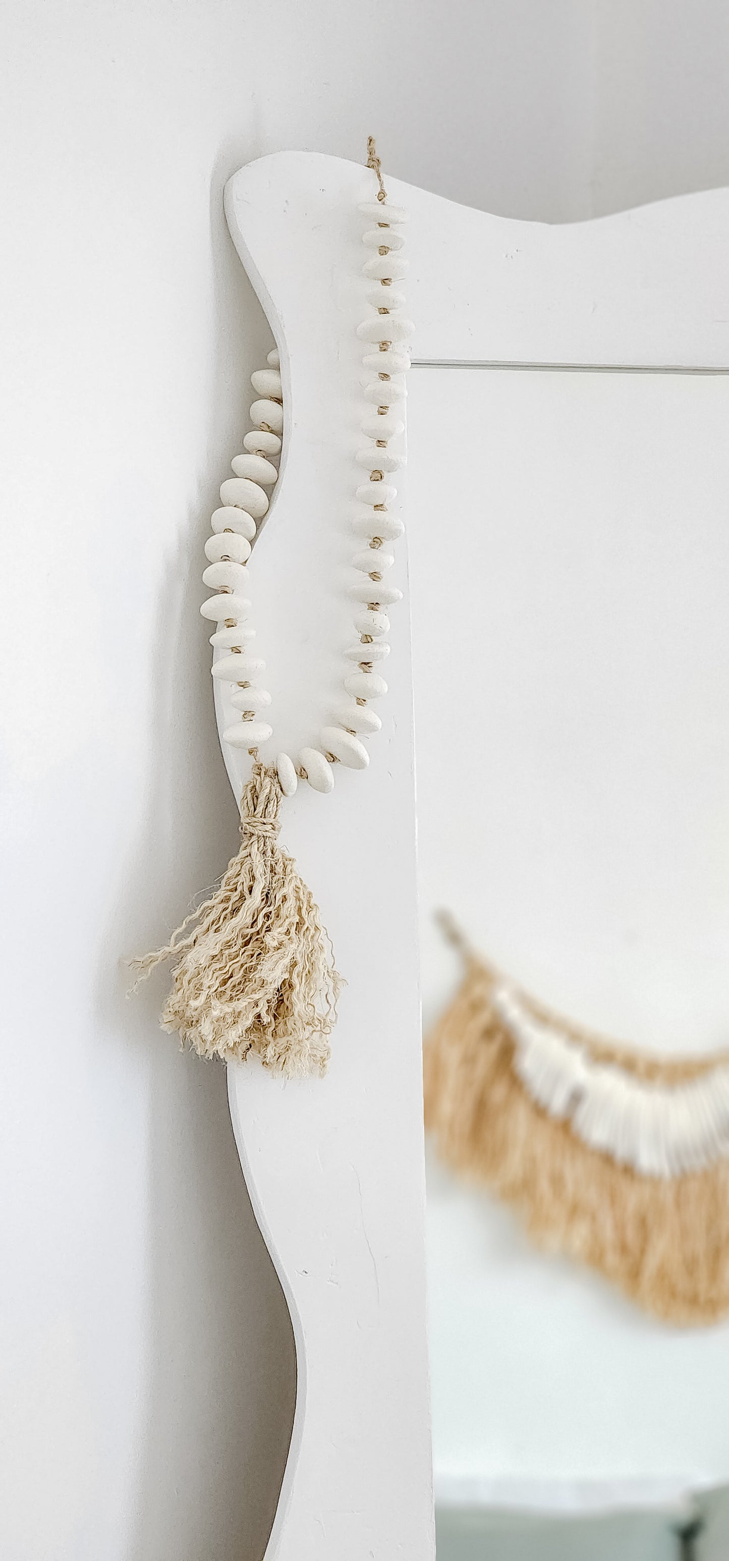 Clay beads with tassel.